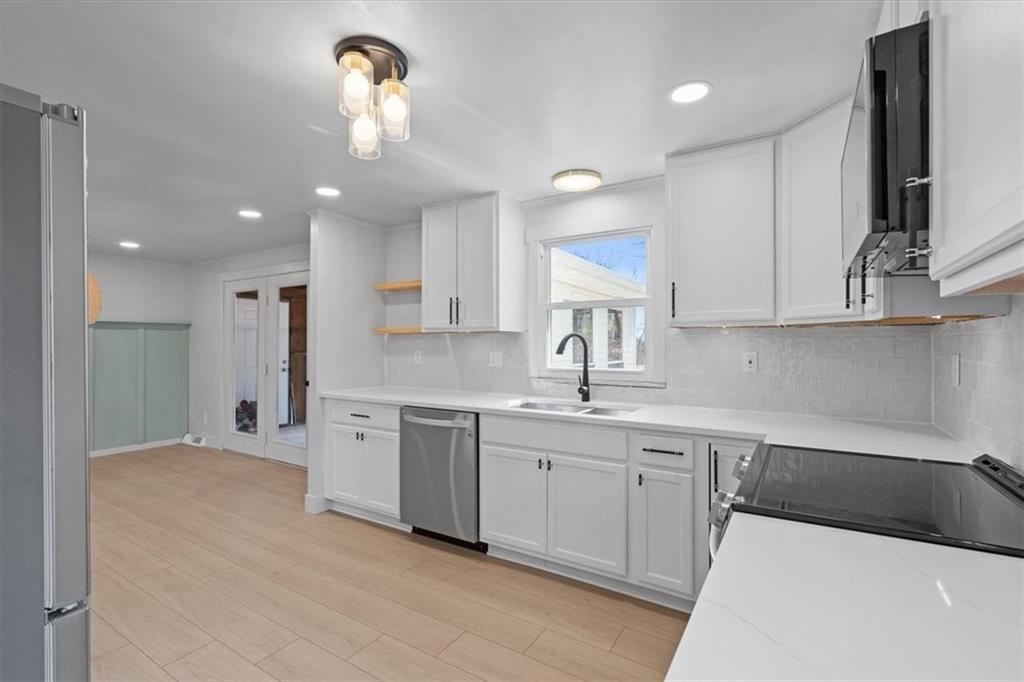 319 Gringo Independence Road Aliquippa, PA 15001 - Photo 7 of 25 a kitchen with a sink cabinets and window