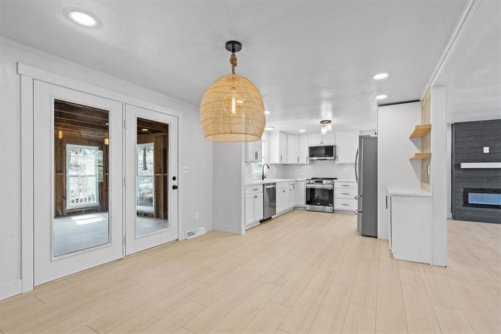 319 Gringo Independence Road Aliquippa, PA 15001 - Photo 9 of 25 a view of a kitchen with a sink a refrigerator and window