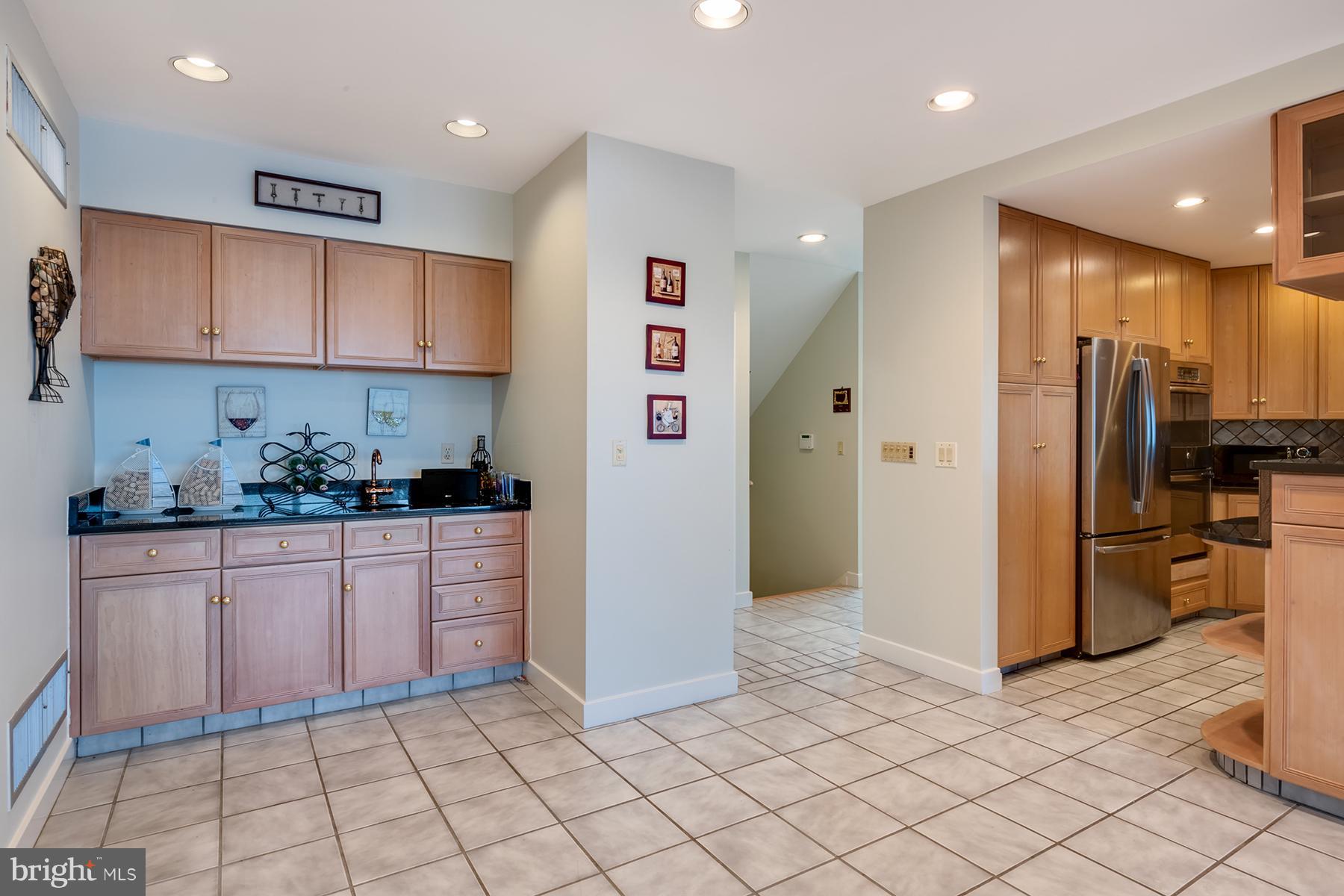65 Slama Road Edgewater, MD 21037 - Photo 11 of 27 There is a wet bar in the family room
