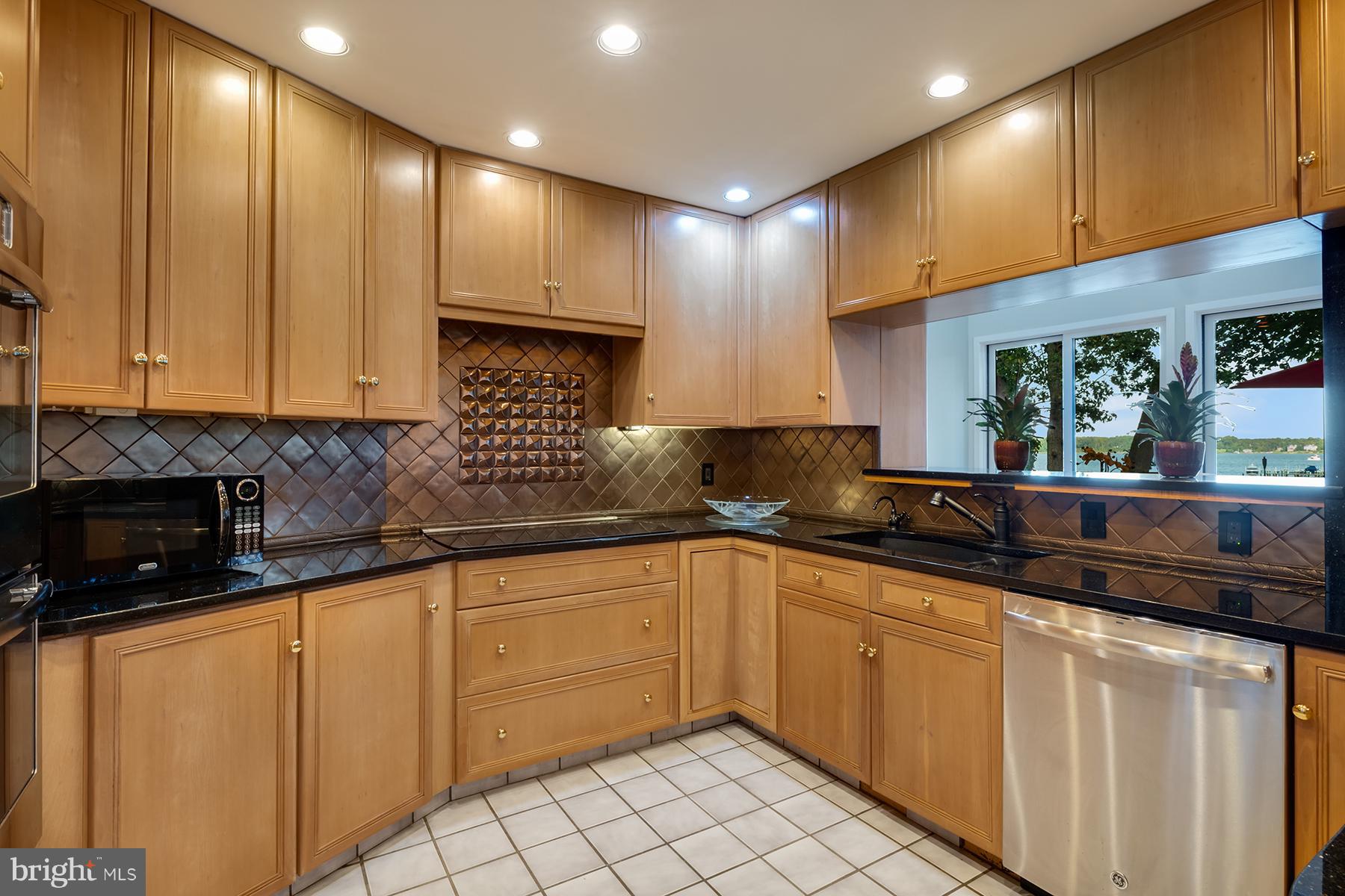 65 Slama Road Edgewater, MD 21037 - Photo 12 of 27 Kitchen has water views and a breakfast bar
