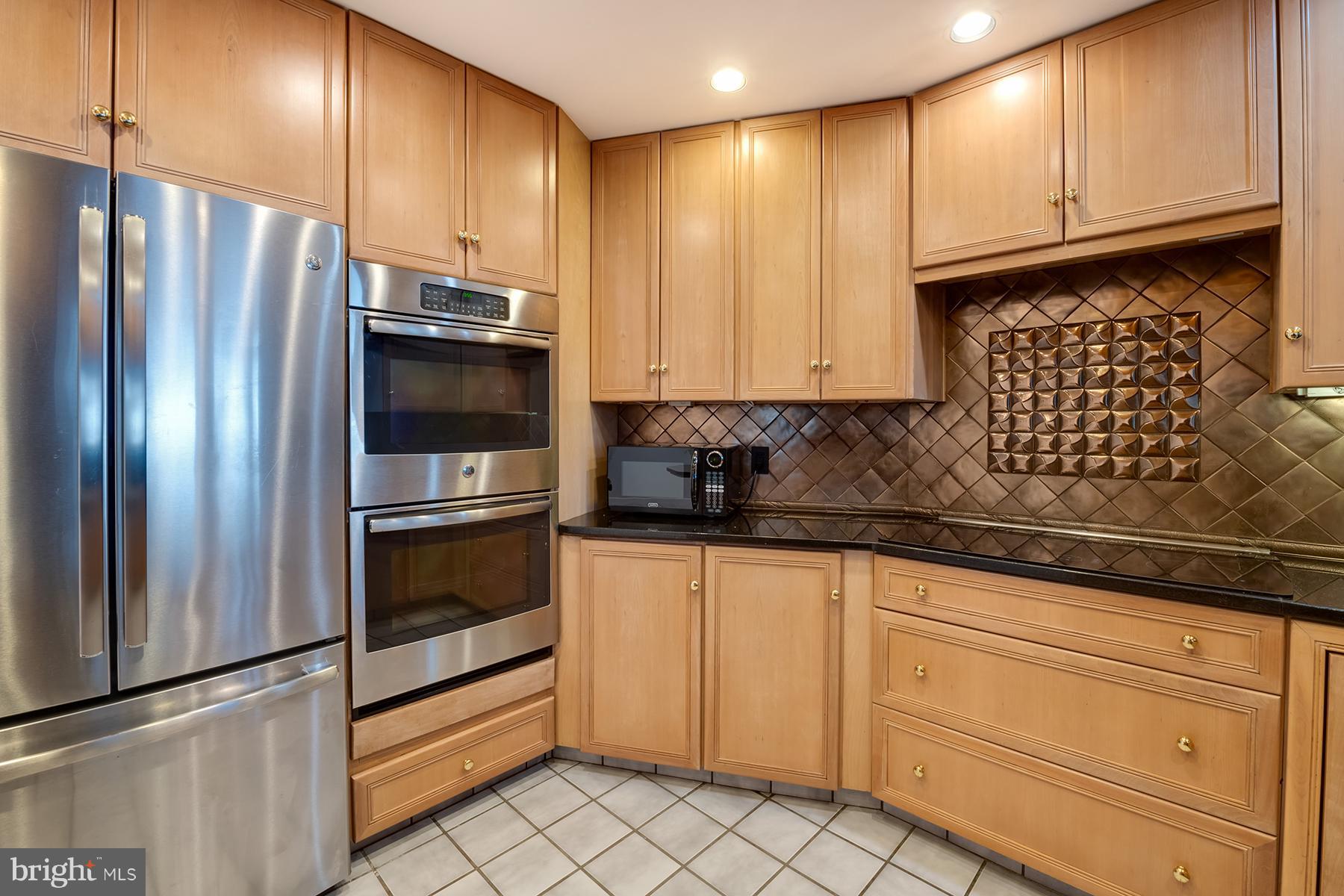 65 Slama Road Edgewater, MD 21037 - Photo 13 of 27 Dark granite and stainless steel appliances