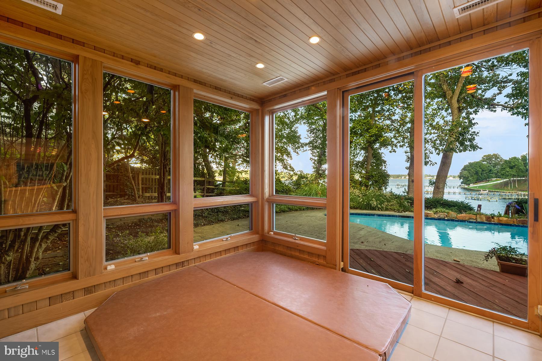 65 Slama Road Edgewater, MD 21037 - Photo 14 of 27 The solarium has peaceful water views