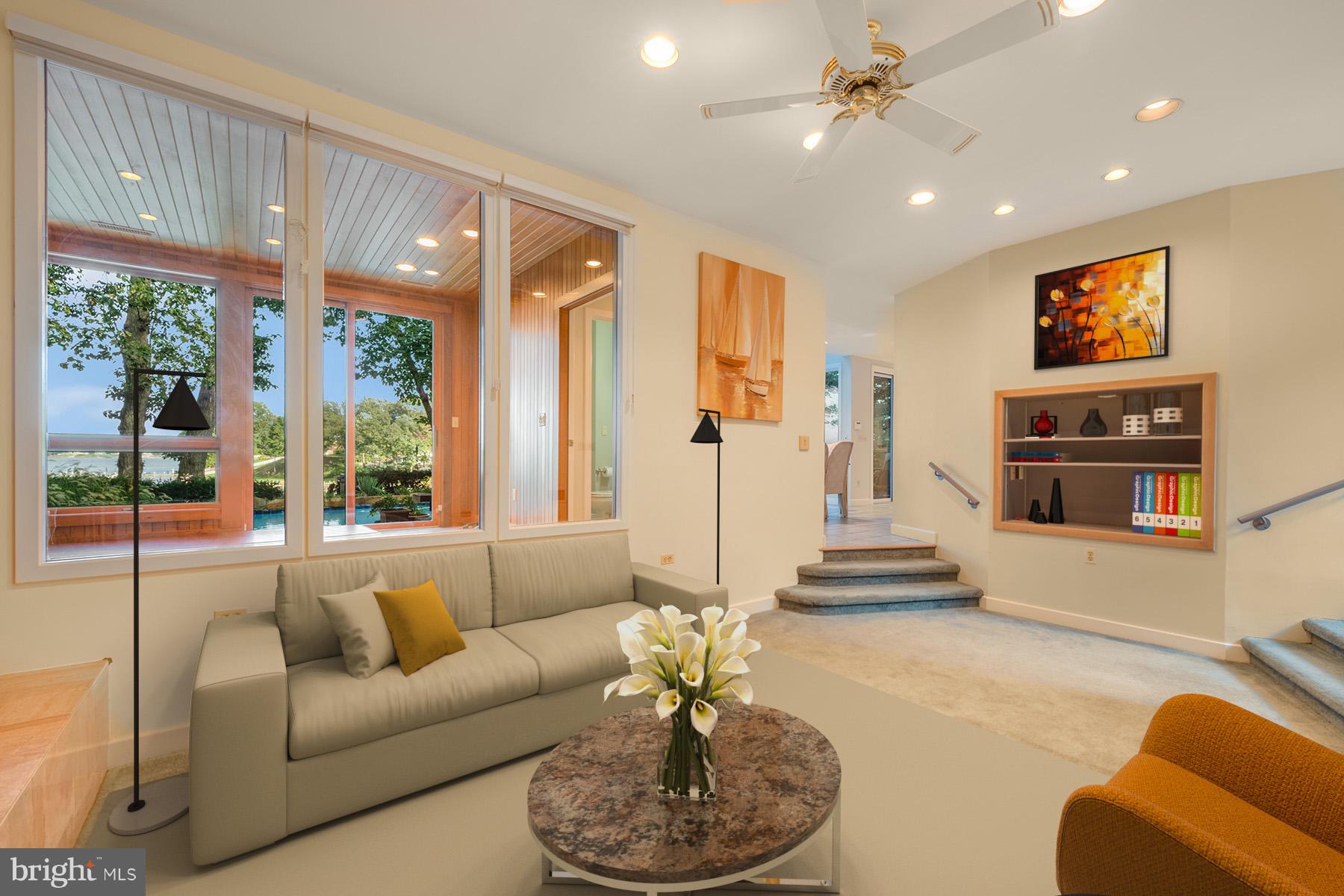 65 Slama Road Edgewater, MD 21037 - Photo 7 of 27 Water views through the solarium from living room