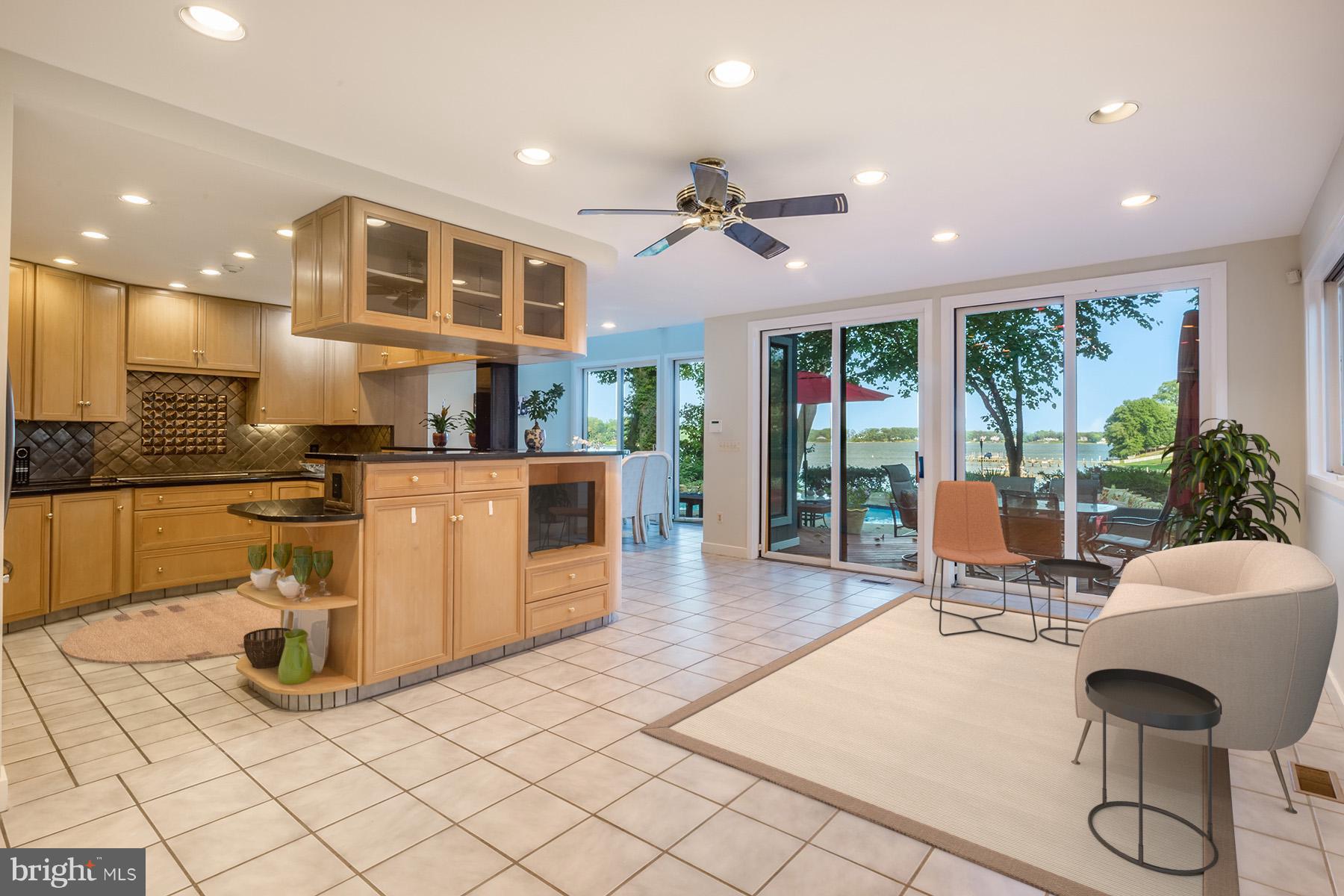 65 Slama Road Edgewater, MD 21037 - Photo 10 of 27 Family room off kitchen with sliders to patio