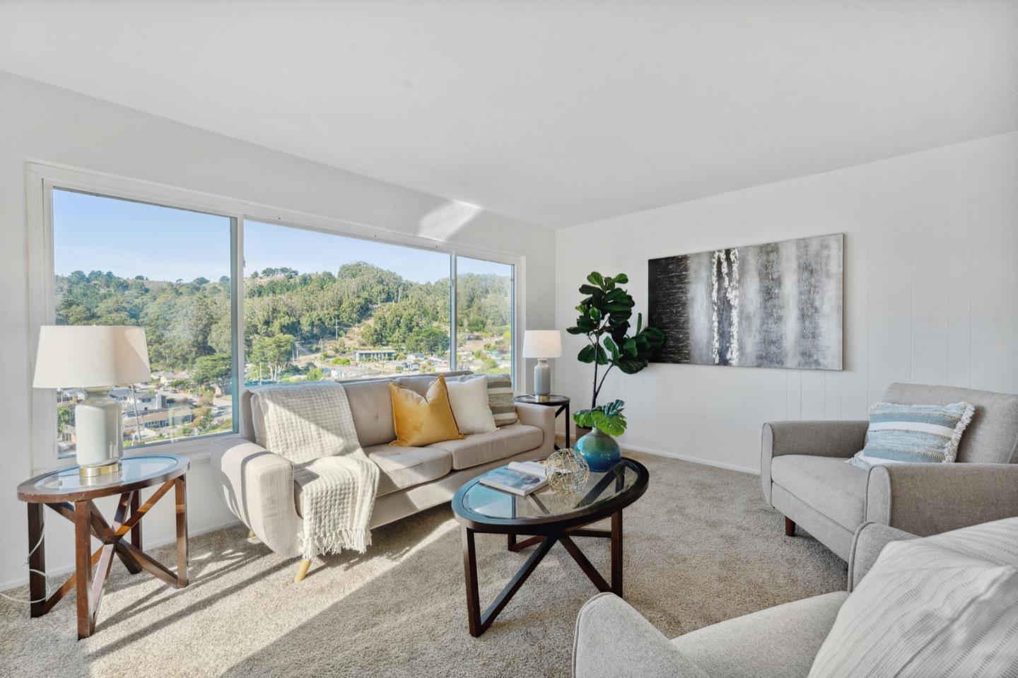 1060 Crespi Drive Pacifica, CA 94044 - Photo 10 of 32 a living room with furniture and a large window
