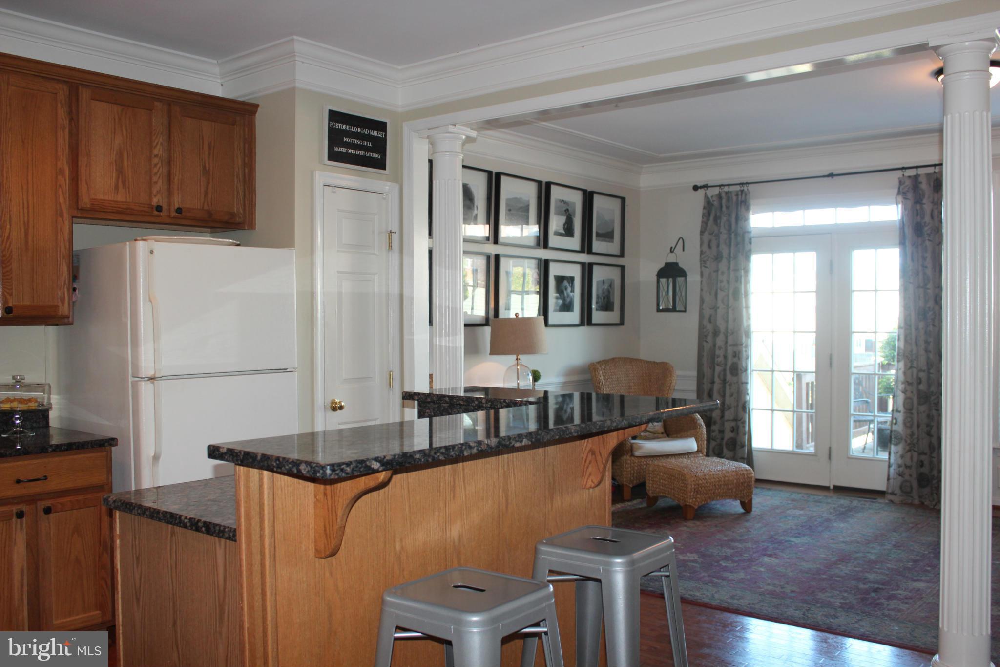 3812 Addison Woods Road Frederick, MD 21704 - Photo 5 of 30 Granite Kitchen into Morning Room
