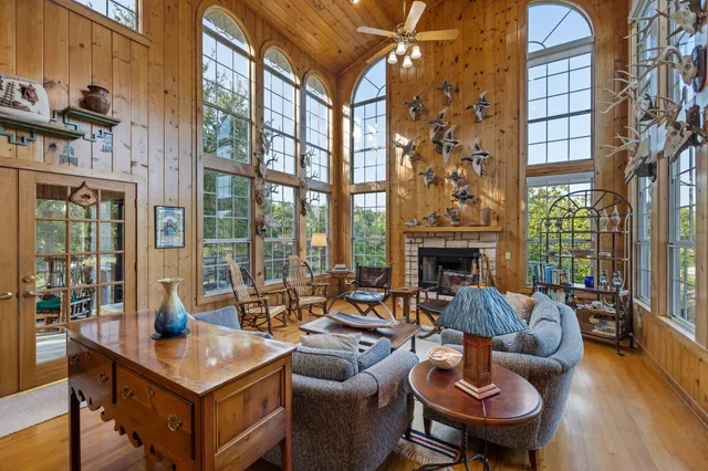 a view of a garden with wooden bench