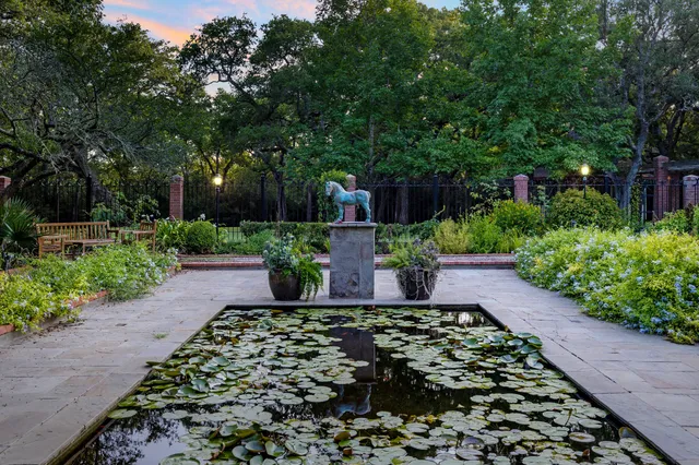 a view of a kitchen with a table and chairs