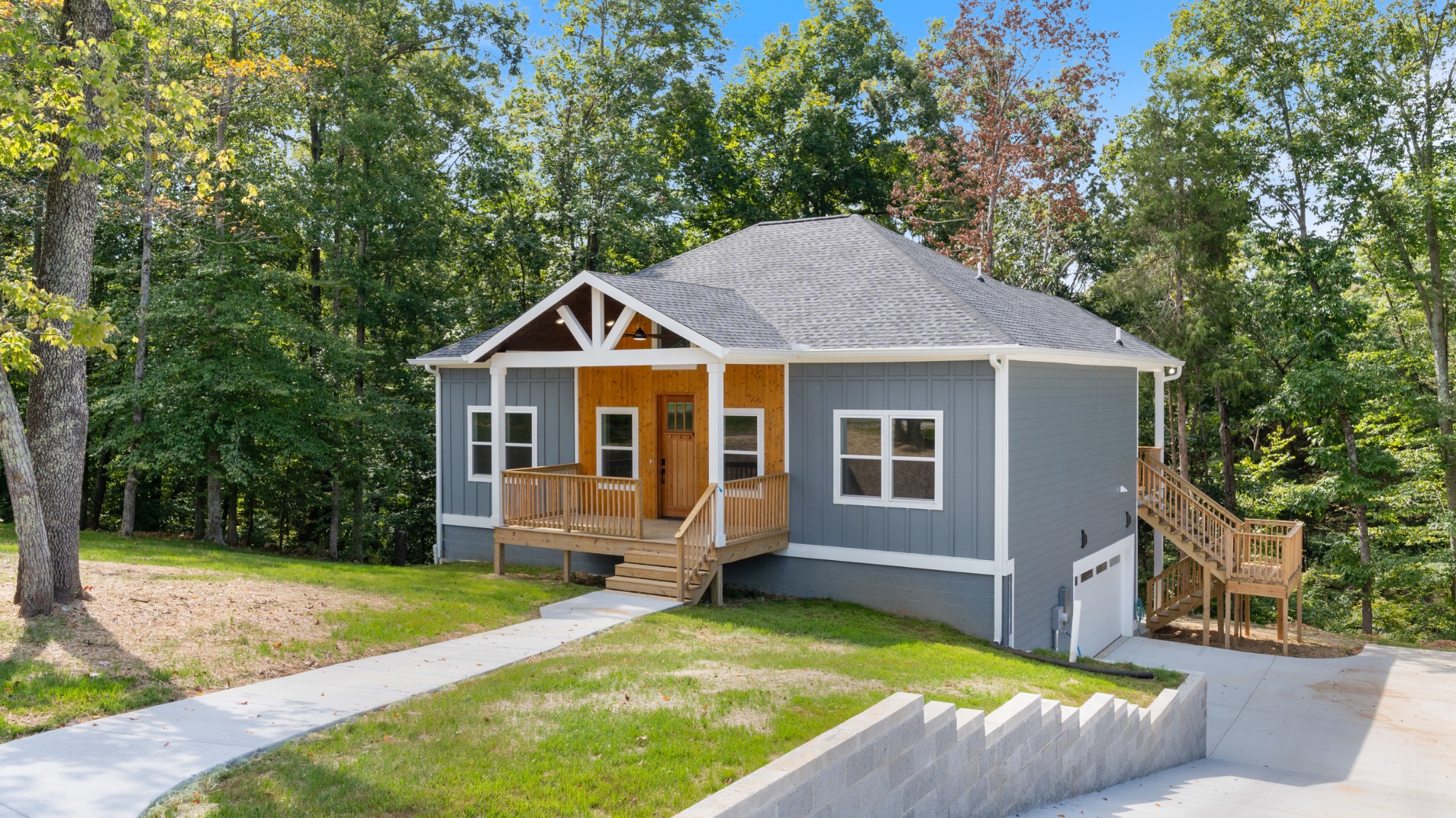 a view of house with backyard
