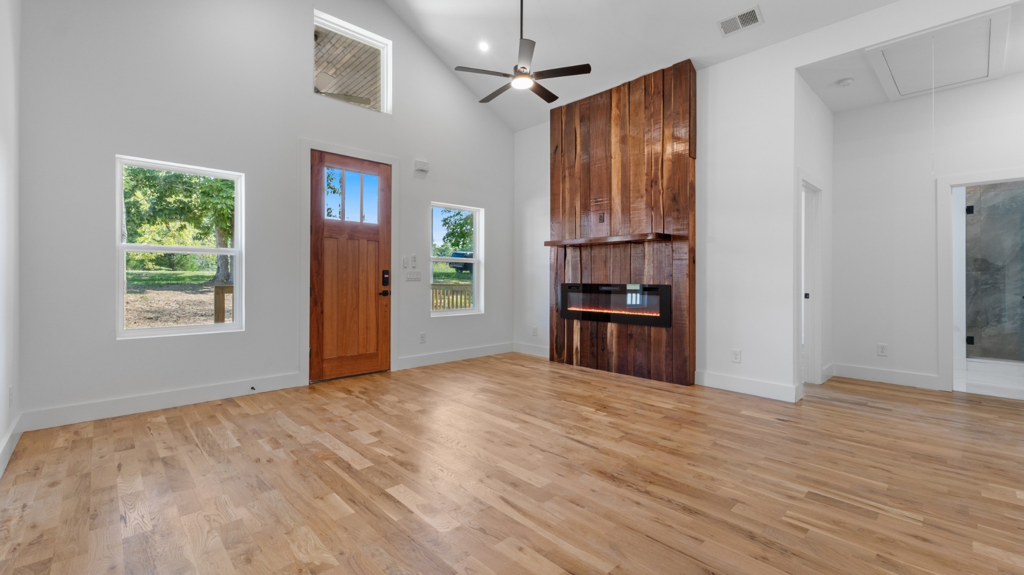 108 Devils Backbone Lane Manchester, TN 37355 - Photo 11 of 51 a view of a kitchen with an empty room and wooden floor