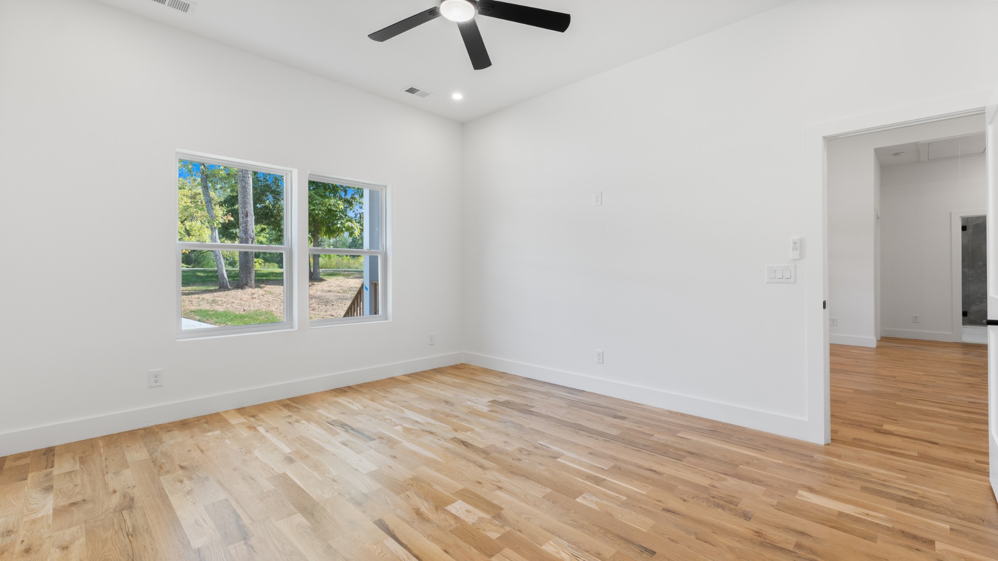 108 Devils Backbone Lane Manchester, TN 37355 - Photo 24 of 51 wooden floor in an empty room with a window