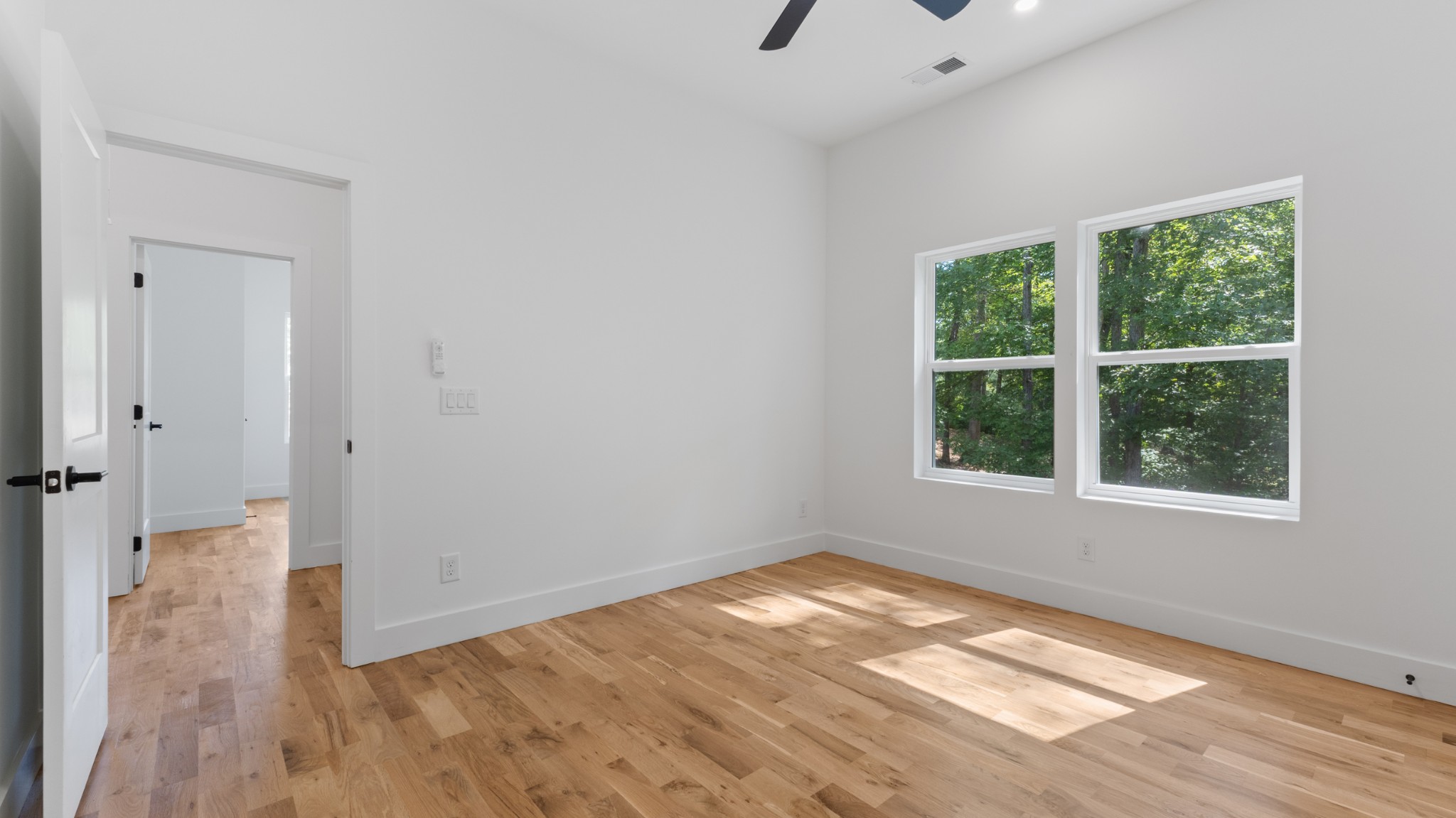 108 Devils Backbone Lane Manchester, TN 37355 - Photo 35 of 51 a view of empty room with wooden floor and fan