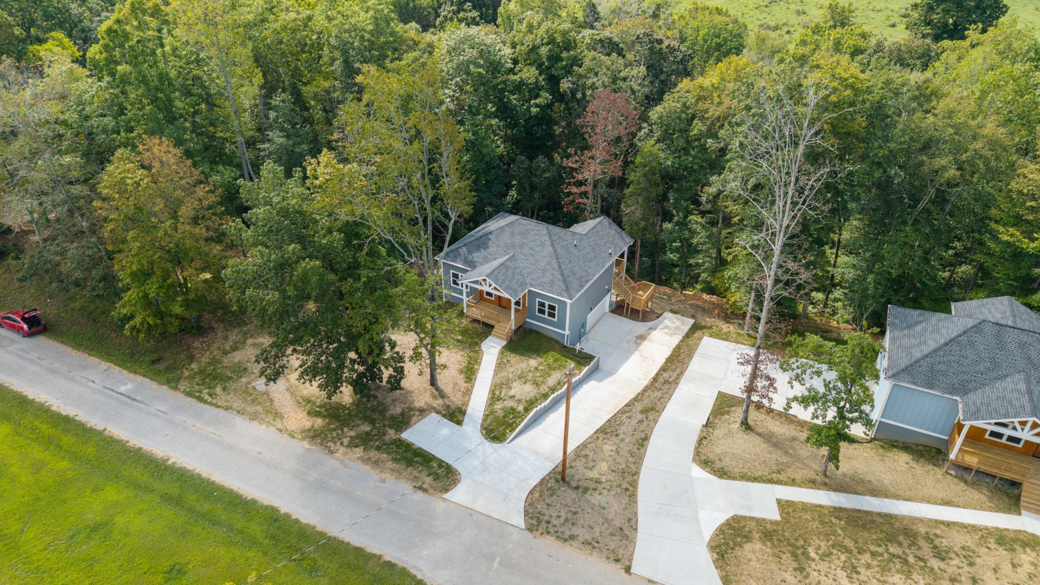 108 Devils Backbone Lane Manchester, TN 37355 - Photo 45 of 51 an aerial view of a house with garden space and sitting area
