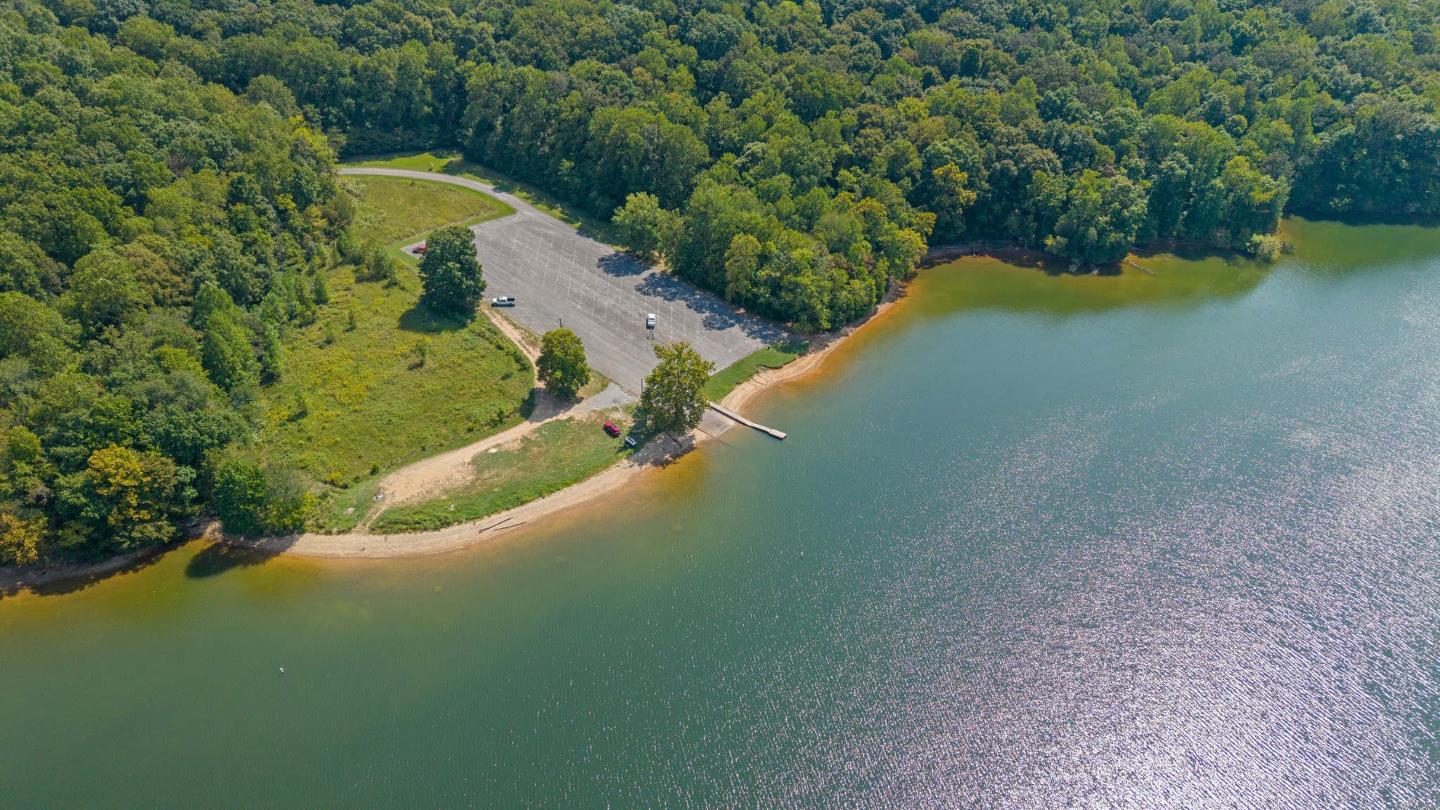 108 Devils Backbone Lane Manchester, TN 37355 - Photo 50 of 51 a view of a lake with a yard