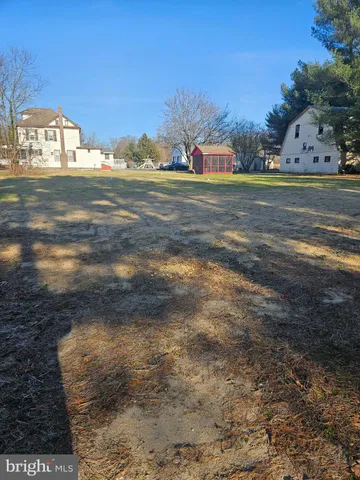 a view of a big yard next to a building