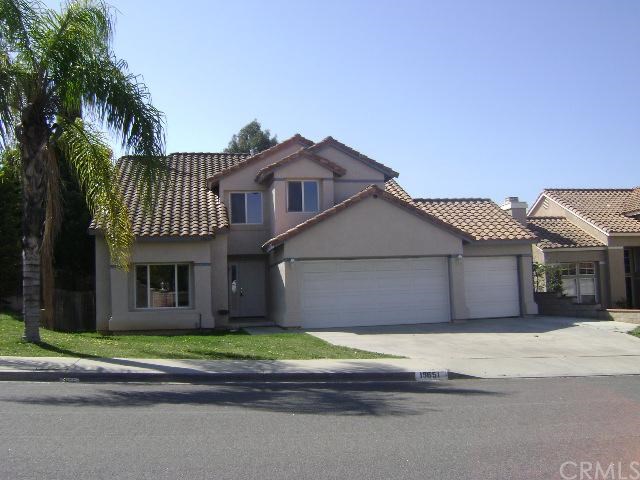 19651 Citrus Grove Road Riverside, CA 92508 - Photo 1 of 1 a house that has a tree in front of it