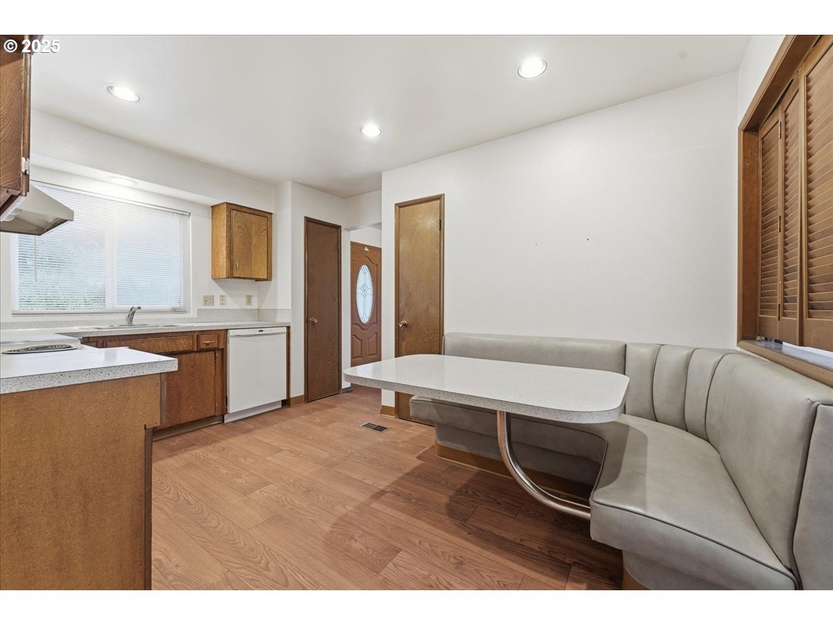 6760 Southwest 199th Court Beaverton, OR 97078 - Photo 11 of 44 a living room with a couch and a sink