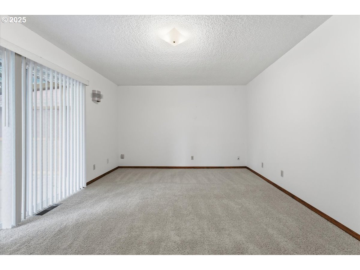 6760 Southwest 199th Court Beaverton, OR 97078 - Photo 15 of 44 a view of an empty room
