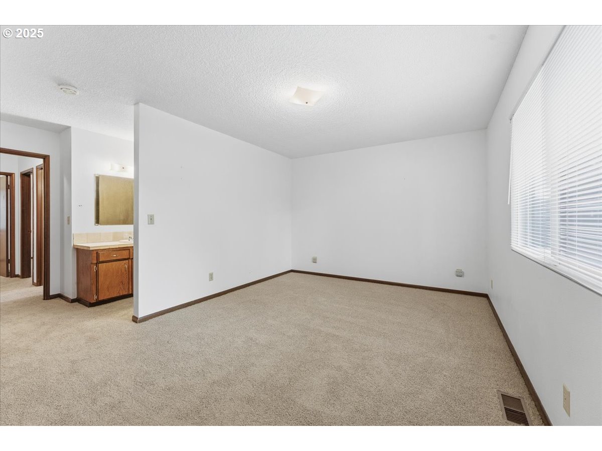 6760 Southwest 199th Court Beaverton, OR 97078 - Photo 22 of 44 a view of a room with an empty room