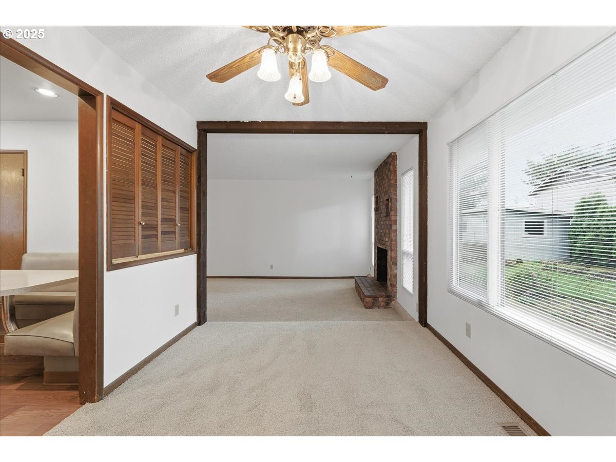 6760 Southwest 199th Court Beaverton, OR 97078 - Photo 9 of 44 a view of an empty room and window