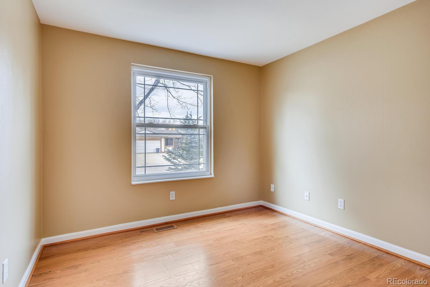 6734 Kendall Street Arvada, CO 80003 - Photo 16 of 36 an empty room with a window