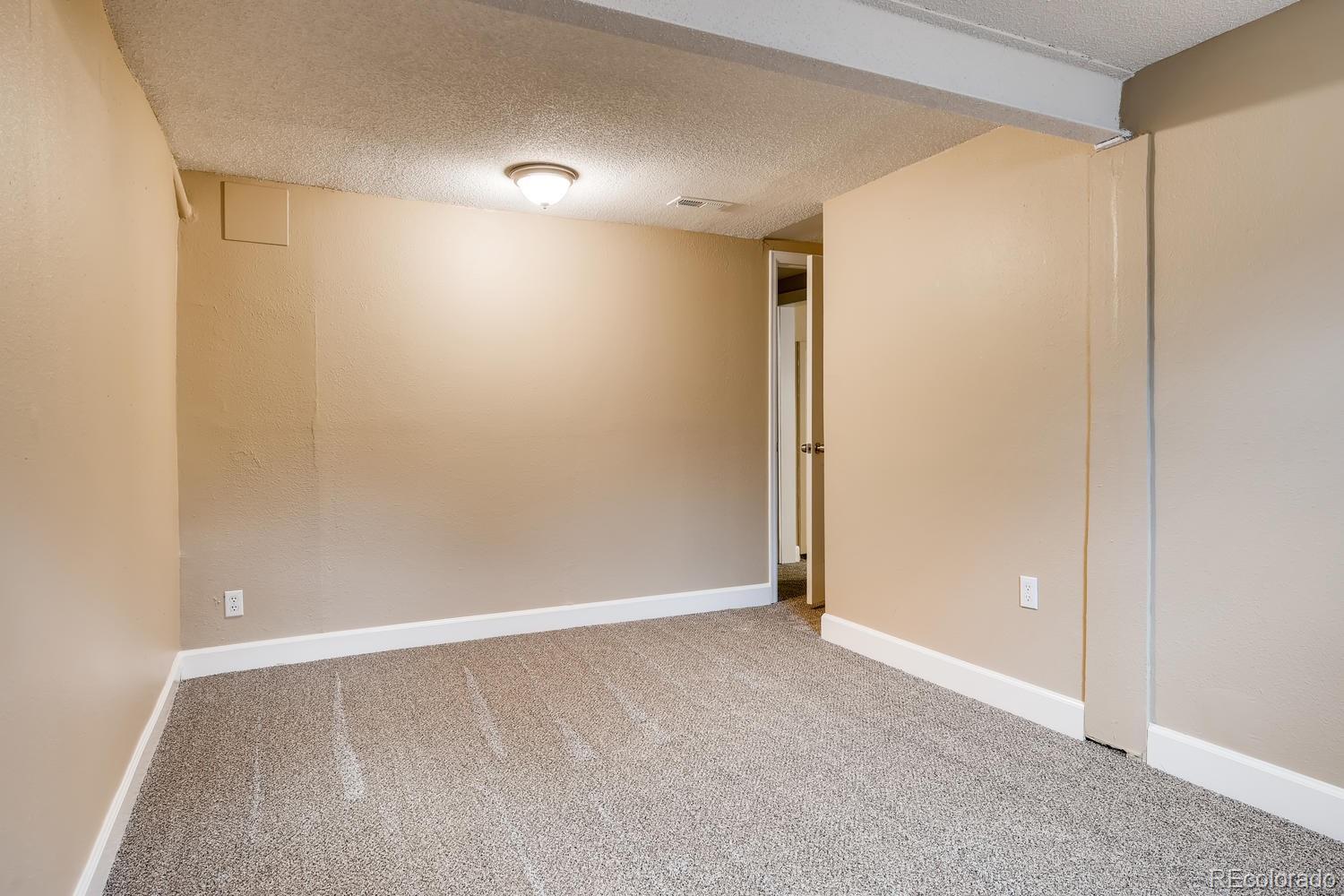 6734 Kendall Street Arvada, CO 80003 - Photo 21 of 36 a view of an empty room