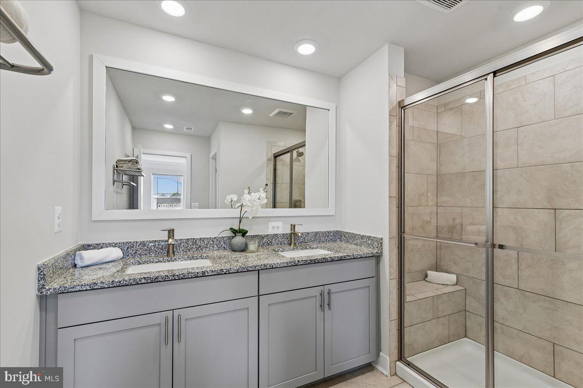 2209 Woodlands Road Windsor Mill, MD 21244 - Photo 26 of 75 UPGRADED EN-SUITE W/ DOUBLE SINK & WALK IN SHOWER