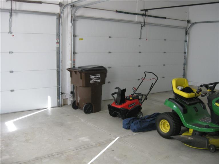 10261 Timber Ridge Drive Milan, MI 48160 - Photo 27 of 52 3 car garage with separate door openers