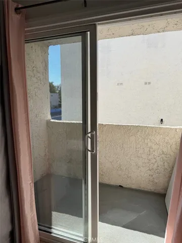 a view of a bathroom with a bathtub