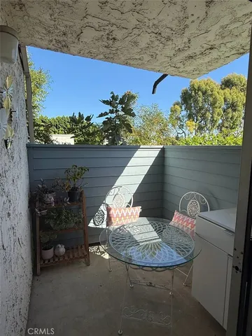 a view of a living room with furniture