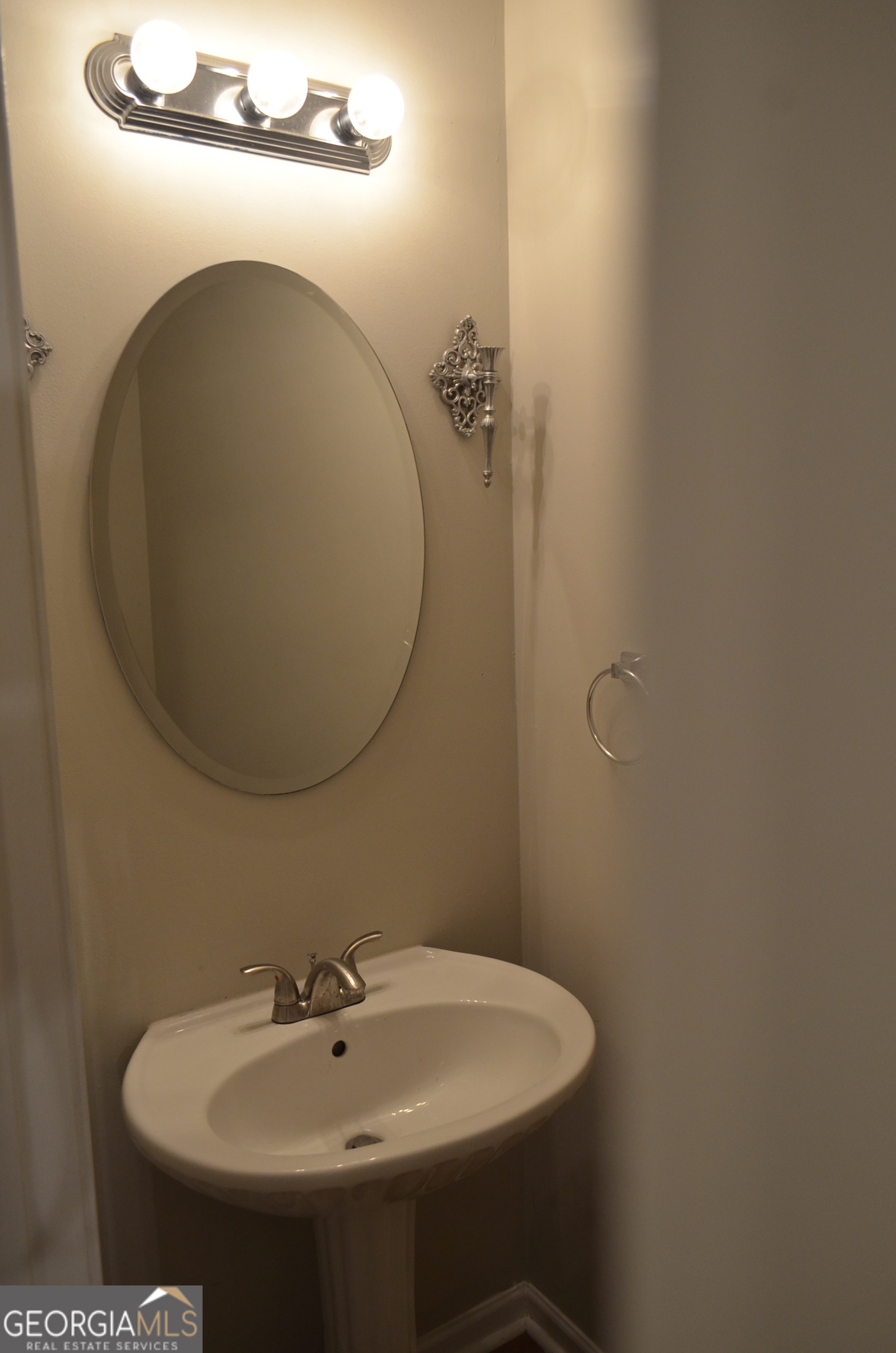 2722 Norfair Loop Lithonia, GA 30038 - Photo 12 of 25 a bathroom with a sink and mirror