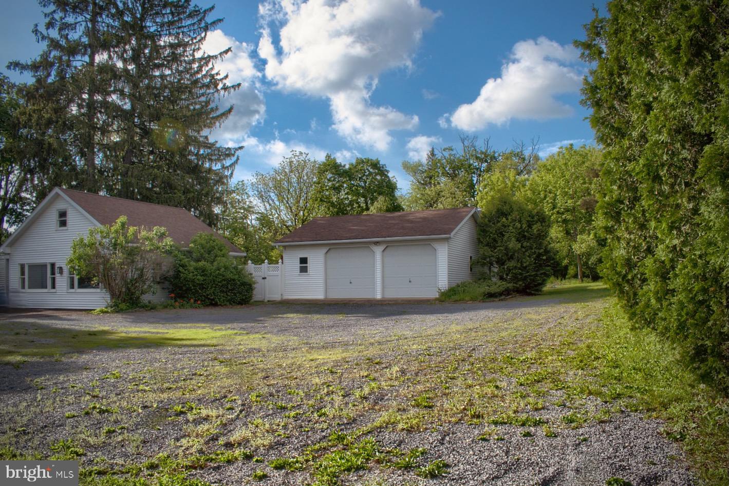 1025 Bloom Road Danville, PA 17821 - Photo 17 of 47 a view of an house with backyard space and balcony
