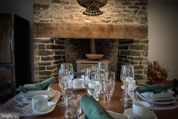 a view of fireplace with black door