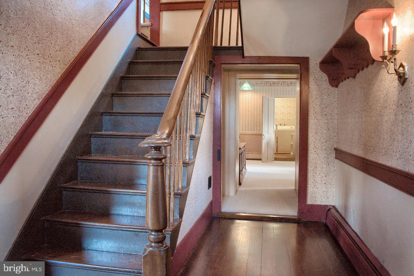 1025 Bloom Road Danville, PA 17821 - Photo 28 of 47 a view of staircase with wooden floor and railing