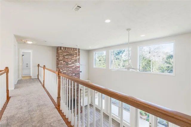a view of hallway with stairs
