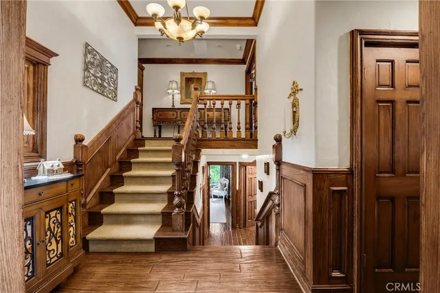 a bathroom with a double vanity sink bathtub and next to a window