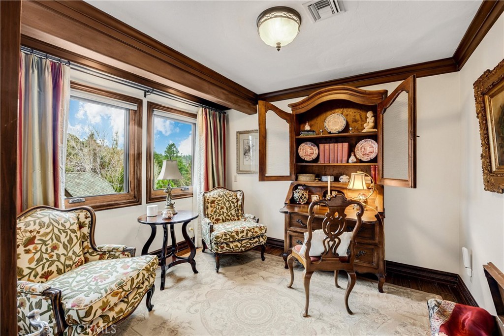 29162 Bald Eagle Ridge Road Lake Arrowhead, CA 92352 - Photo 22 of 69 a living room with furniture and a large window