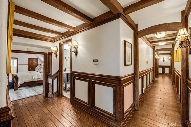 a living room with fireplace furniture and a window