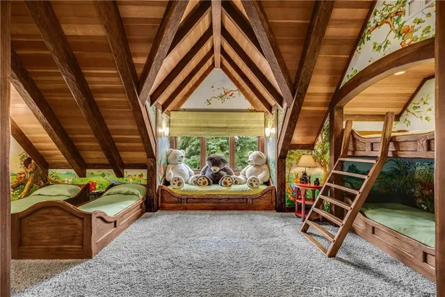 a bathroom with a tub a toilet and a shower