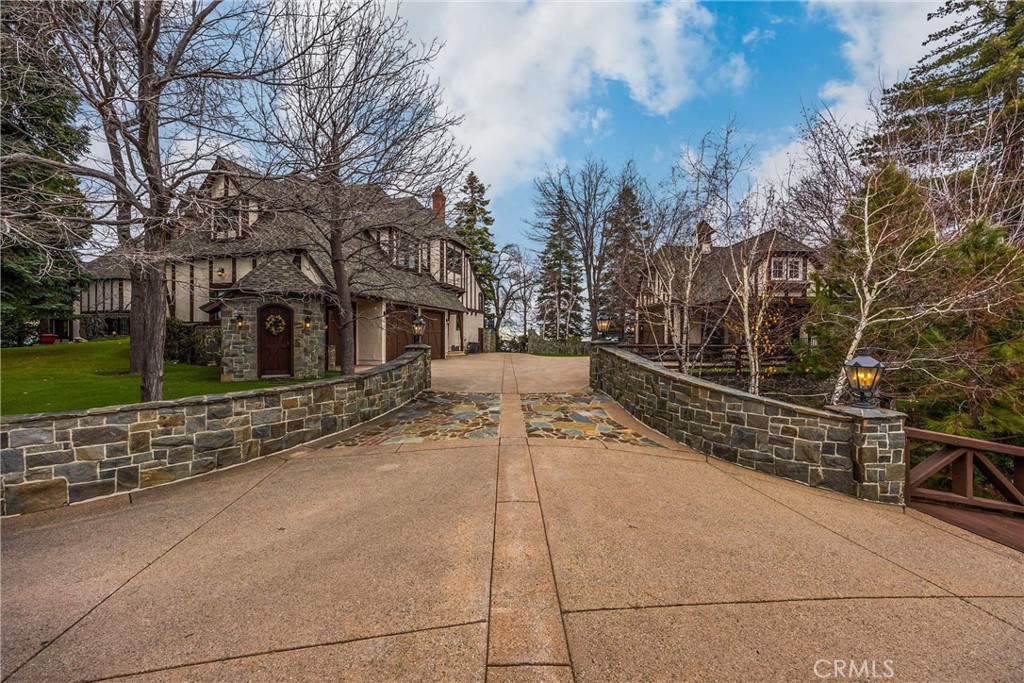 29162 Bald Eagle Ridge Road Lake Arrowhead, CA 92352 - Photo 41 of 69 a view of a patio with a bench