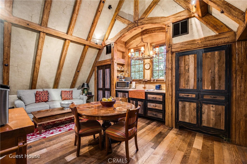 29162 Bald Eagle Ridge Road Lake Arrowhead, CA 92352 - Photo 62 of 69 a view of a chairs and table in a patio