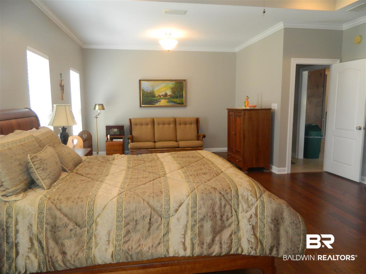 3990 Symphony Way West Semmes, AL 36575 - Photo 19 of 45 Relax in the Master bedroom sitting area.