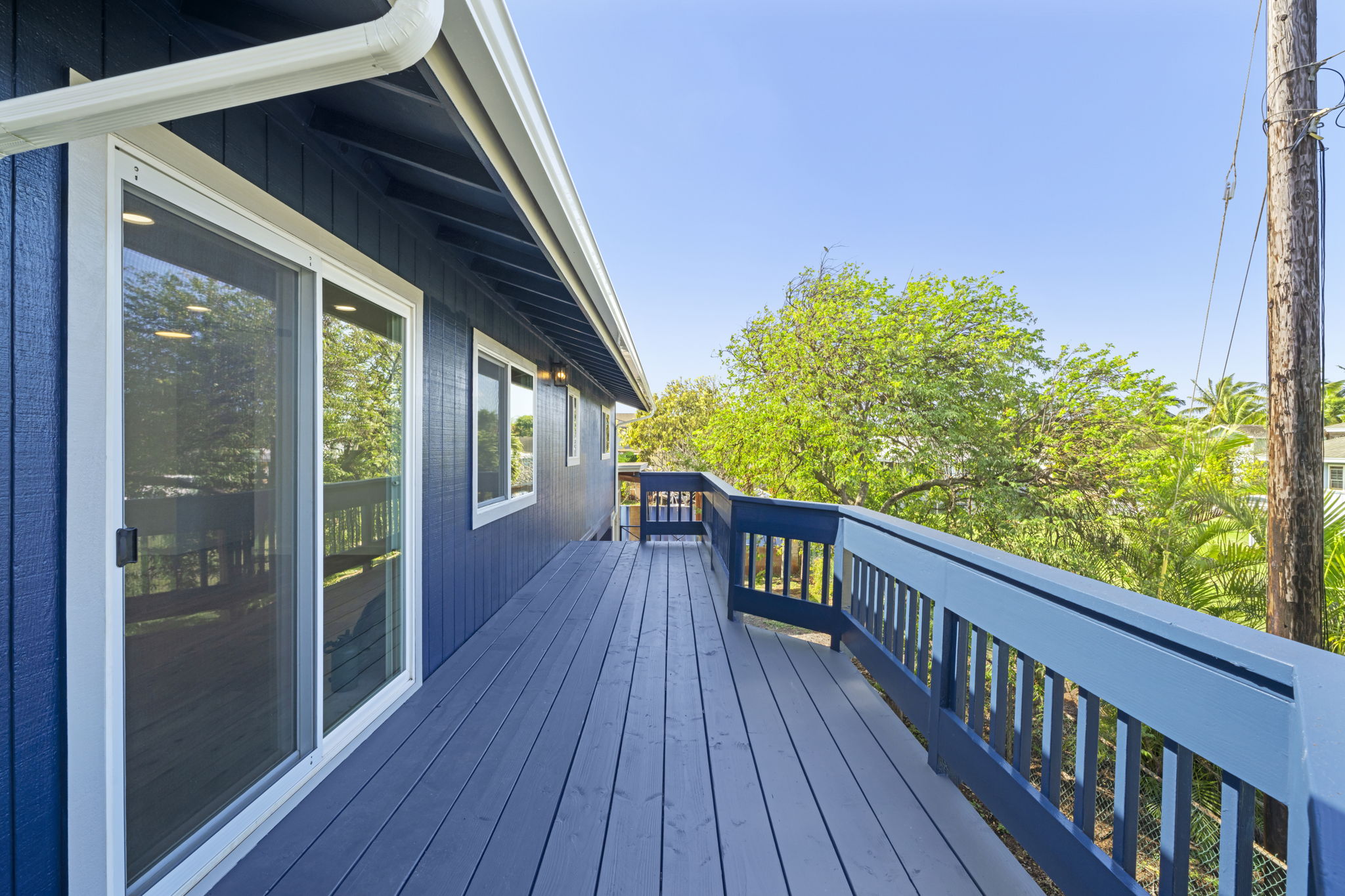 4431 Iona Road Hanapepe, HI 96705 - Photo 18 of 20 a view of a balcony with wooden floor