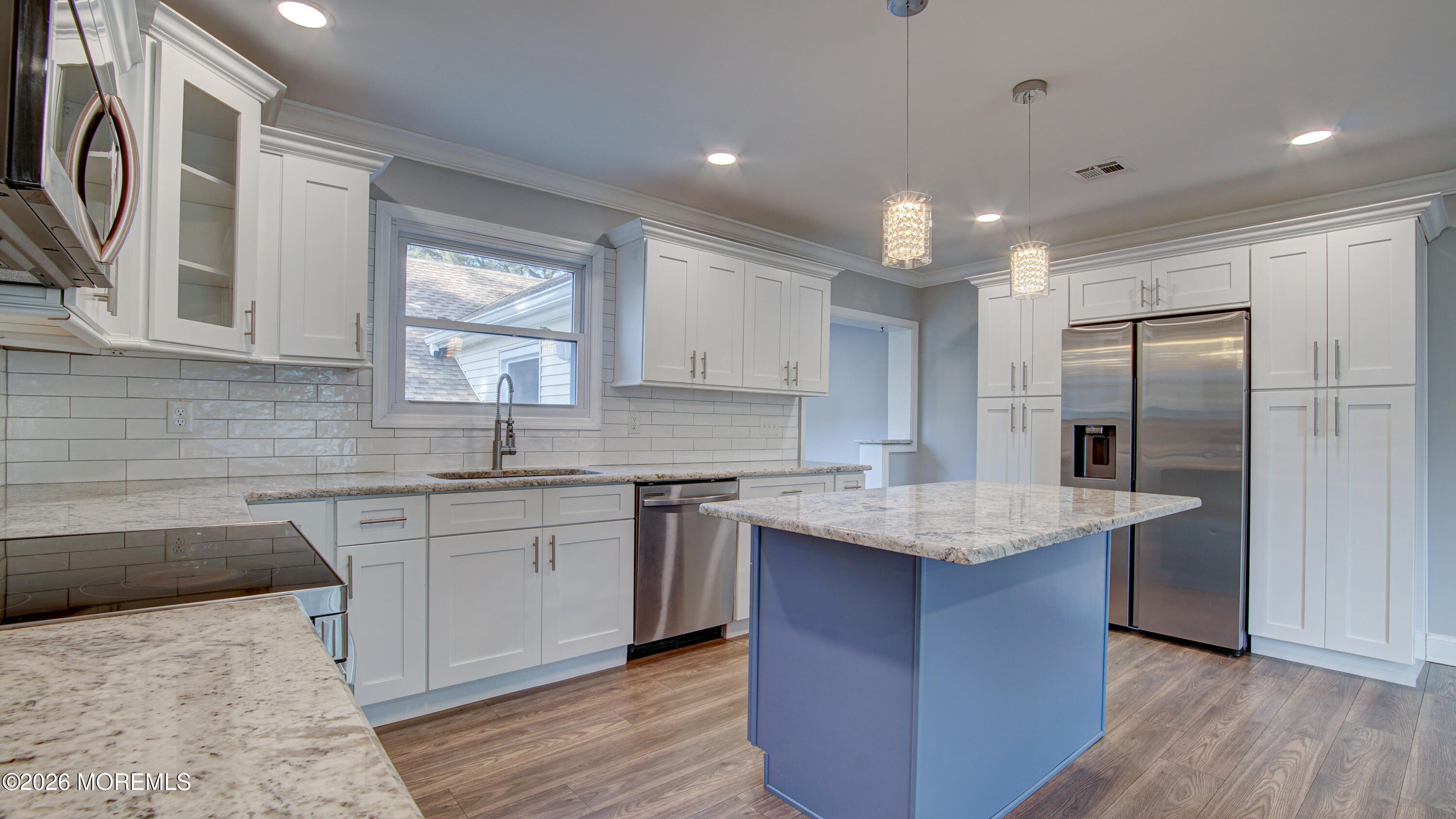 10 Zacatin Road, Unit B Freehold, NJ 07728 - Photo 13 of 39 a kitchen with stainless steel appliances granite countertop a sink stove and refrigerator