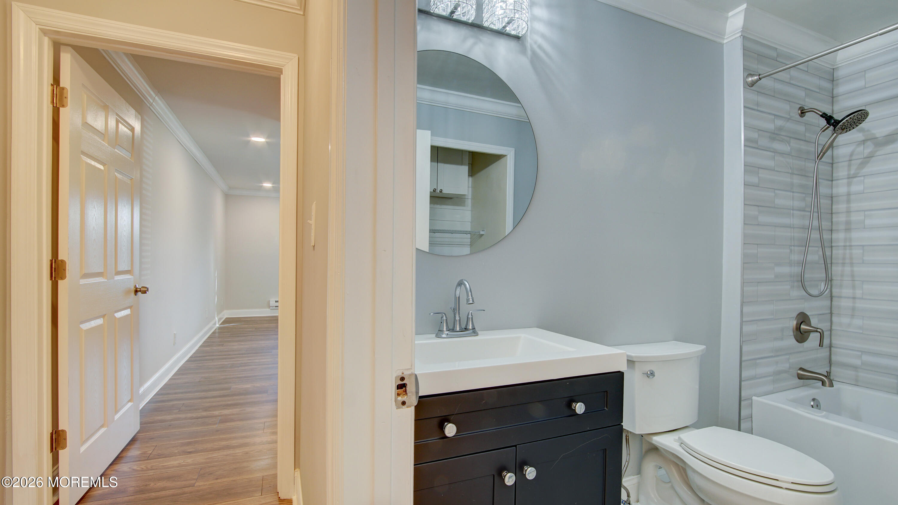 10 Zacatin Road, Unit B Freehold, NJ 07728 - Photo 27 of 39 a bathroom with a sink and a mirror