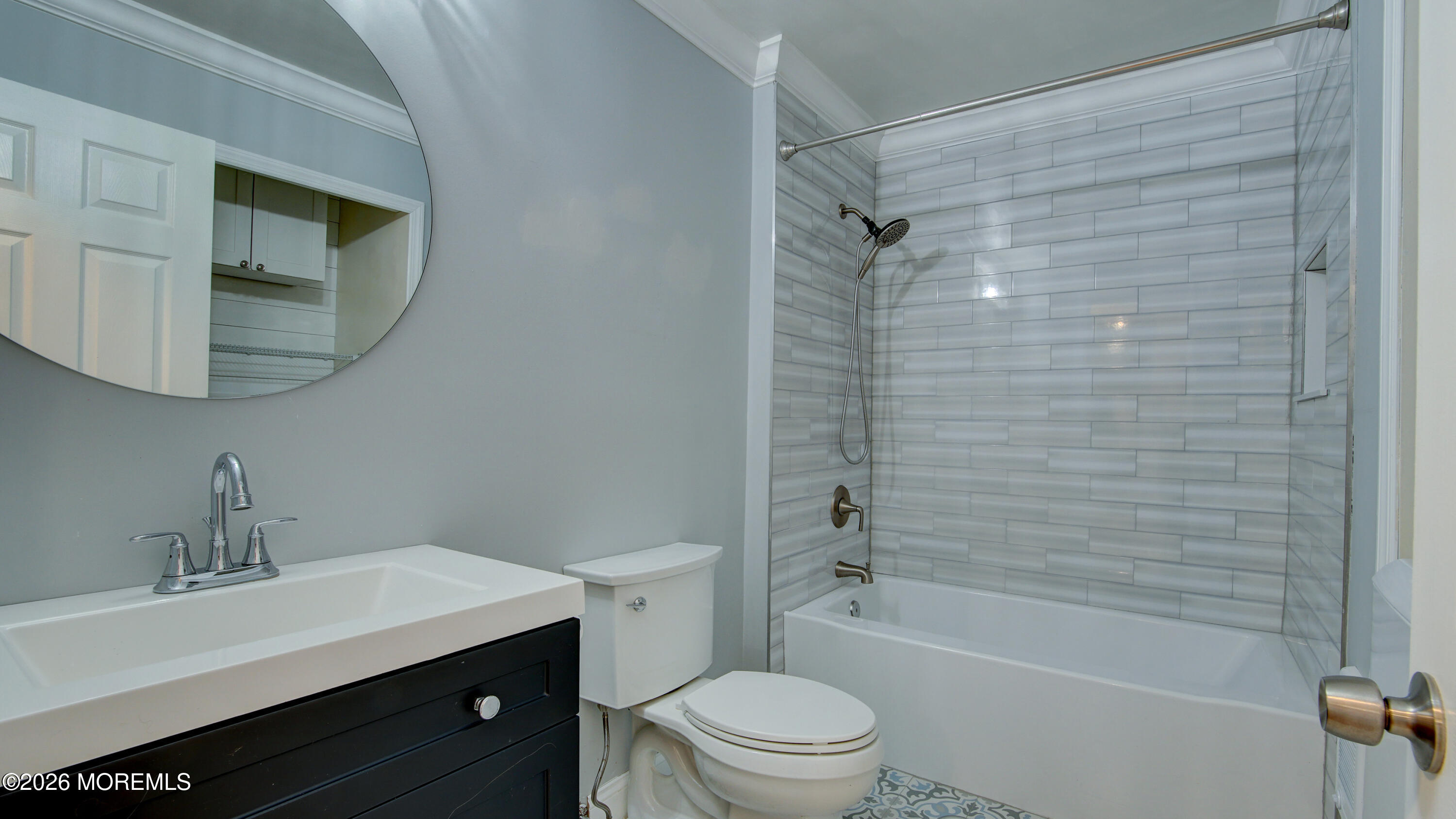 10 Zacatin Road, Unit B Freehold, NJ 07728 - Photo 28 of 39 a bathroom with a sink a toilet and shower