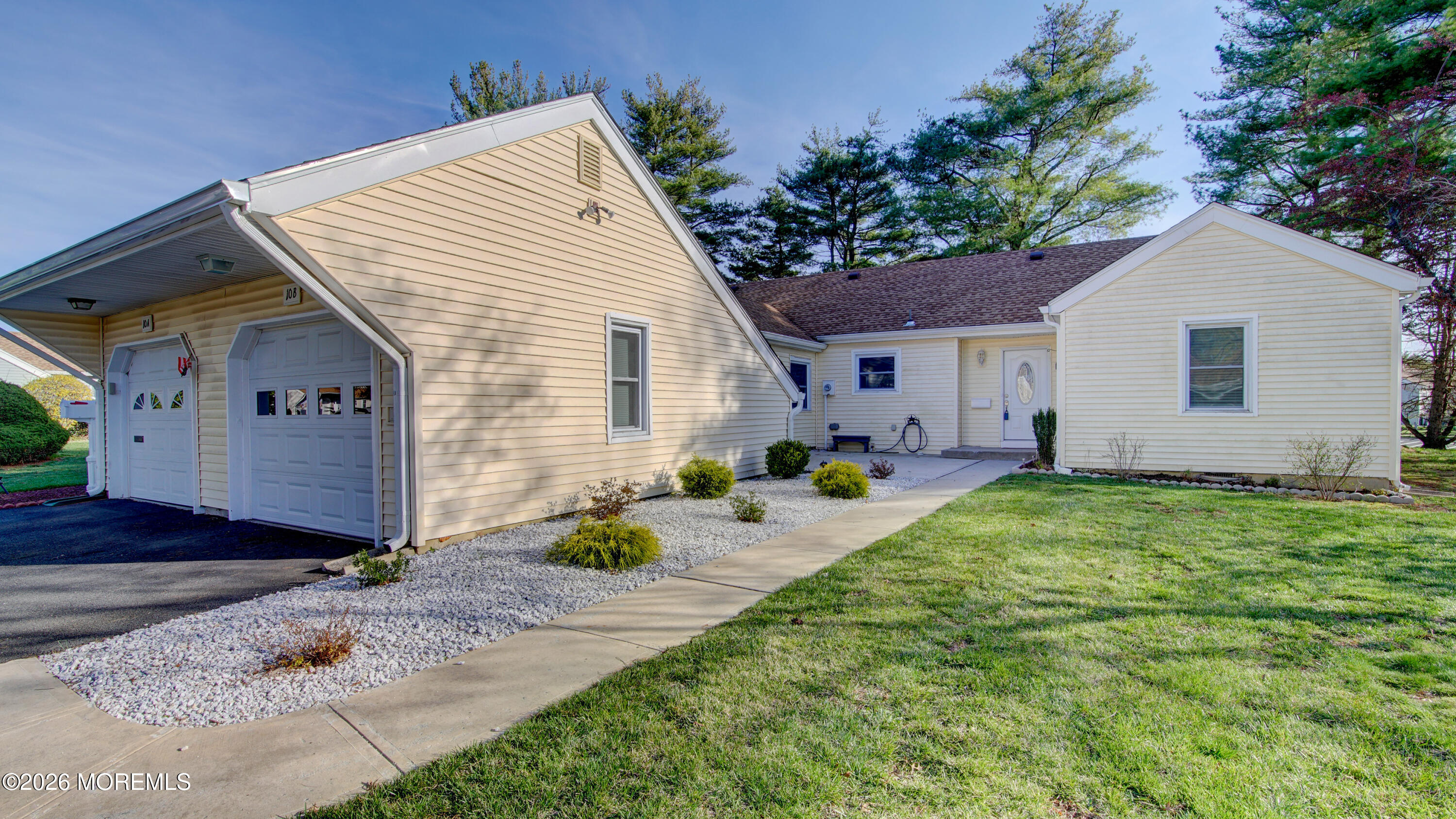 10 Zacatin Road, Unit B Freehold, NJ 07728 - Photo 3 of 39 a front view of house with yard