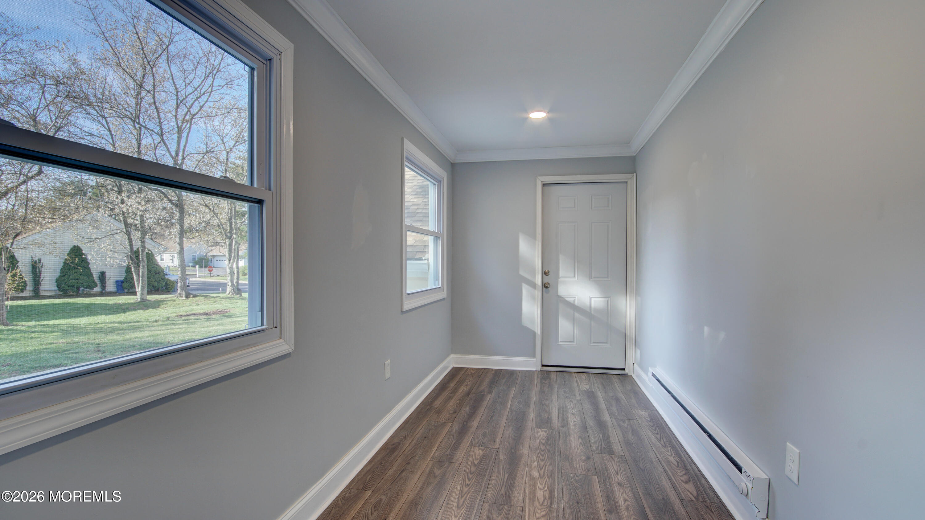 10 Zacatin Road, Unit B Freehold, NJ 07728 - Photo 31 of 39 a view of a room with wooden floor and a window