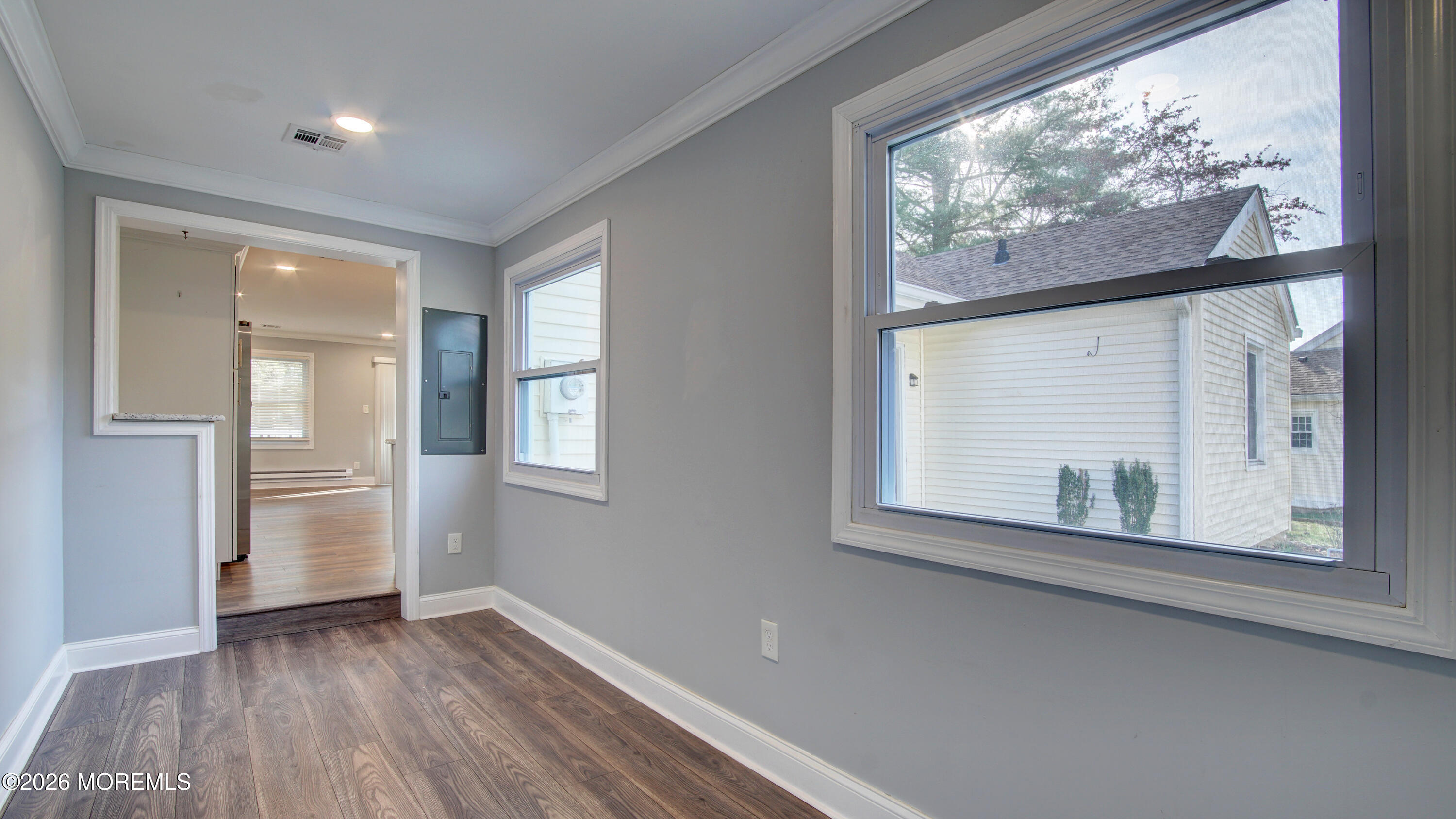 10 Zacatin Road, Unit B Freehold, NJ 07728 - Photo 32 of 39 an empty room with wooden floor and windows