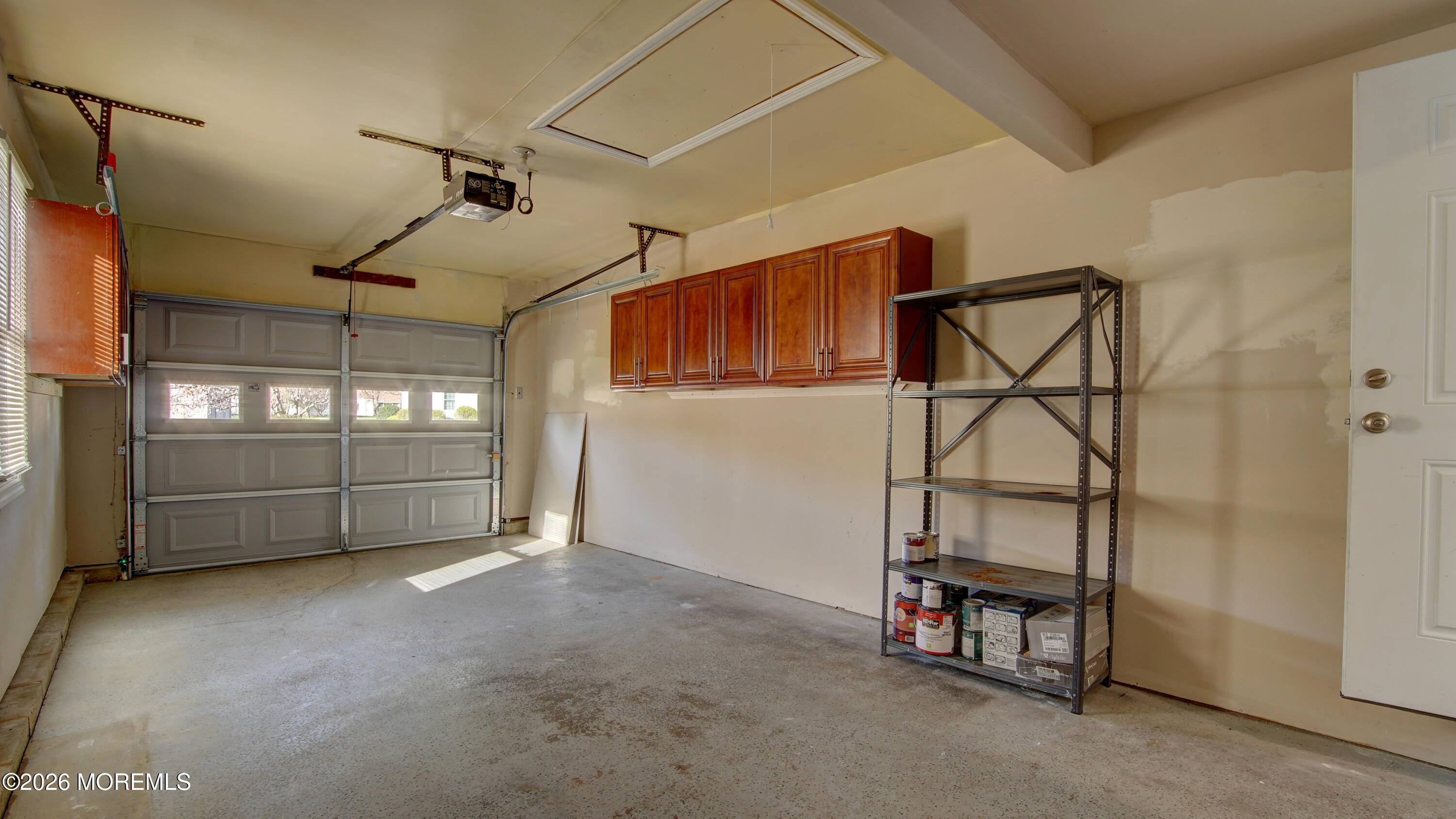 10 Zacatin Road, Unit B Freehold, NJ 07728 - Photo 34 of 39 a view of a room with racks and windows